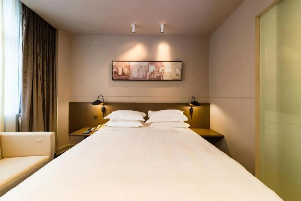 Bed in Jinjiang Inn Select Yancheng Oufeng Hua Street Julong Lake