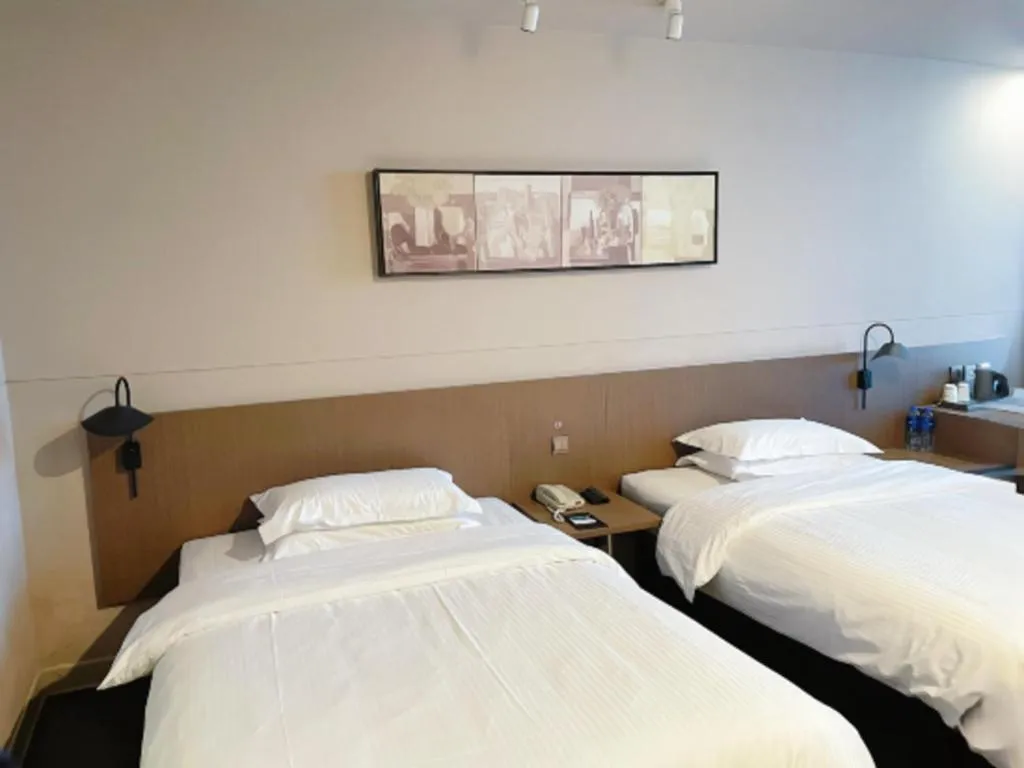 Bed in Jinjiang Inn Select Yancheng Oufeng Hua Street Julong Lake