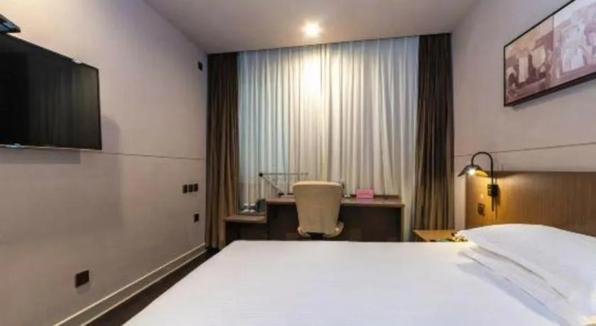 Bed in Jinjiang Inn Select Yancheng Oufeng Hua Street Julong Lake