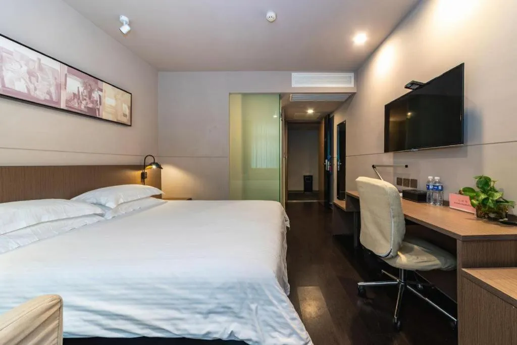 Bed in Jinjiang Inn Select Yancheng Oufeng Hua Street Julong Lake