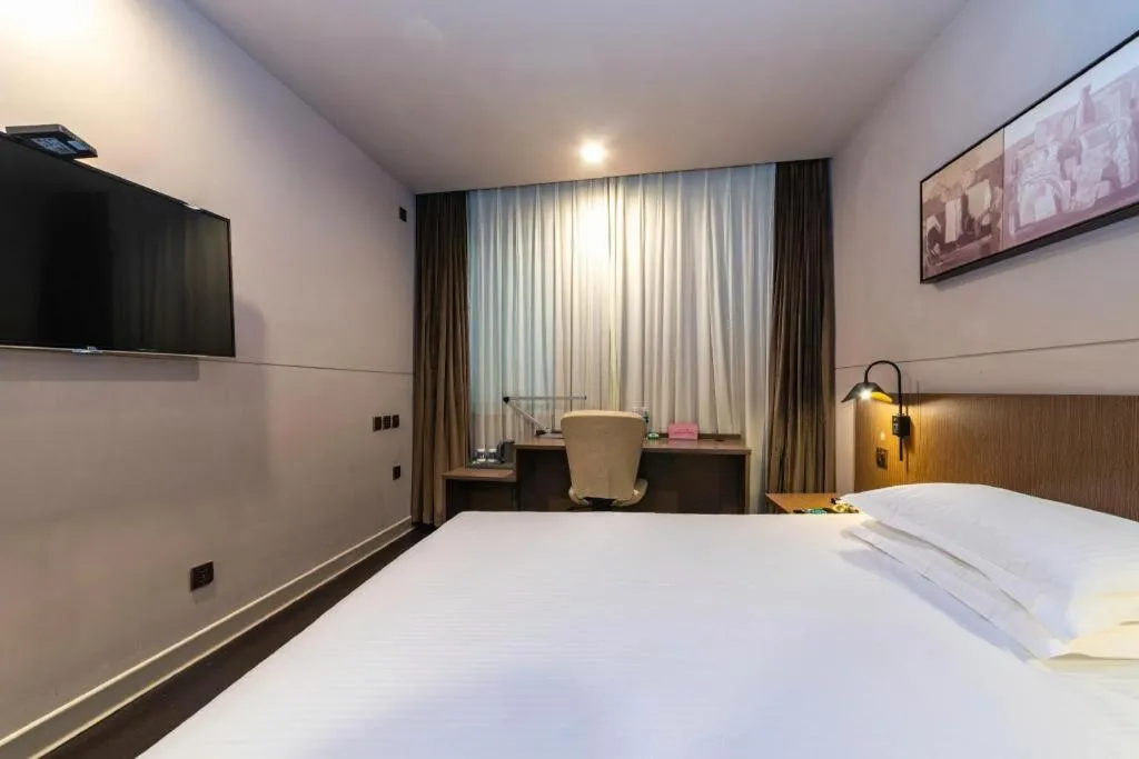 Bed in Jinjiang Inn Select Yancheng Oufeng Hua Street Julong Lake