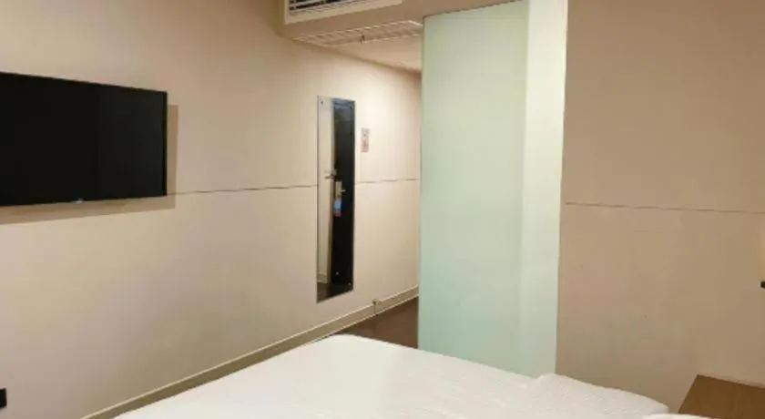 Bed in Jinjiang Inn Select Yancheng Oufeng Hua Street Julong Lake