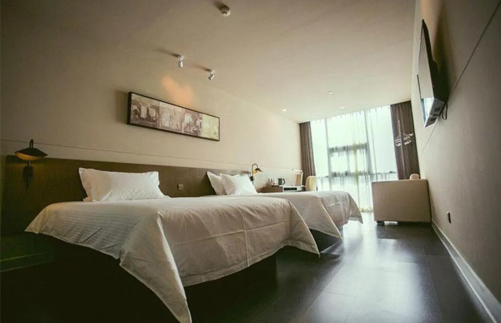 Bed in Jinjiang Inn Select Yancheng Oufeng Hua Street Julong Lake