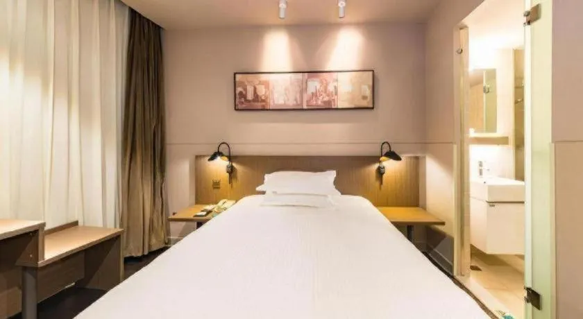 Bed in Jinjiang Inn Select Yancheng Oufeng Hua Street Julong Lake