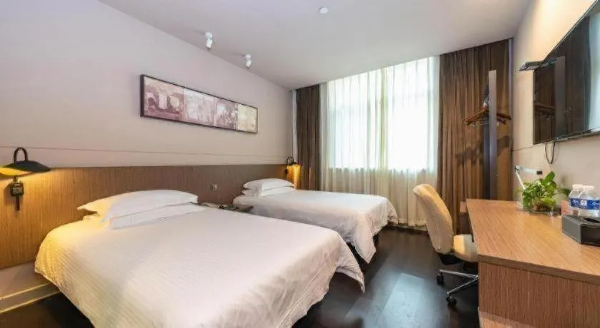 Bed in Jinjiang Inn Select Yancheng Oufeng Hua Street Julong Lake