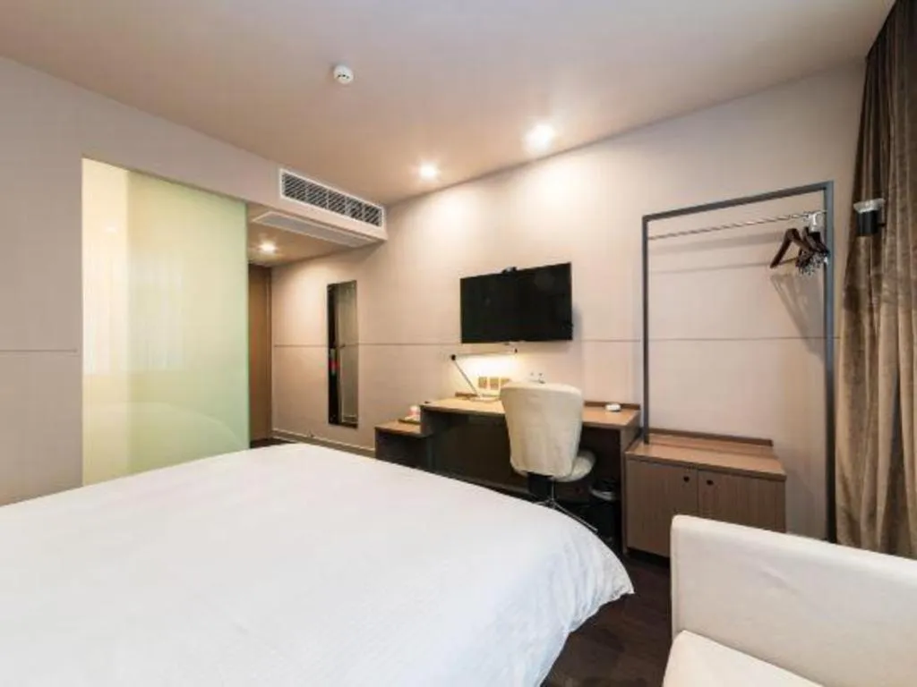 Bed in Jinjiang Inn Select Yancheng Oufeng Hua Street Julong Lake