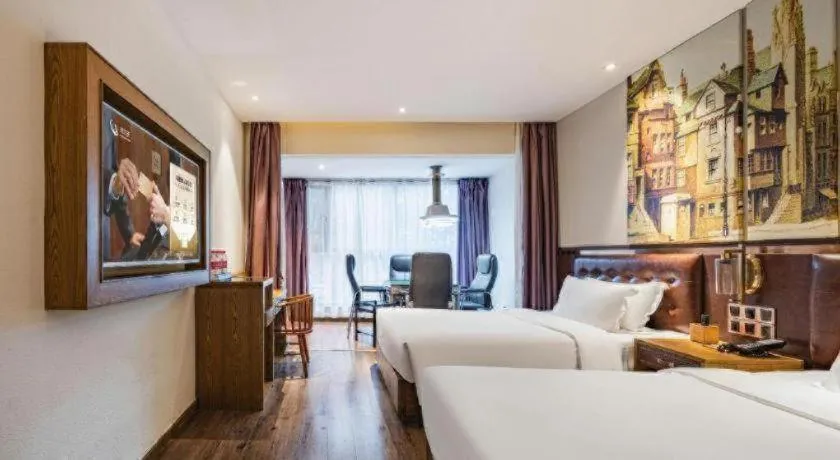 Bed in James Joyce Coffetel·Hengyang Jiefang Road Xianfeng Dock