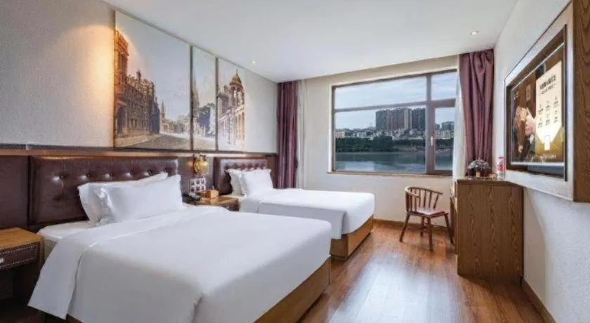 Bed in James Joyce Coffetel·Hengyang Jiefang Road Xianfeng Dock