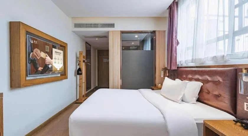 Bed in James Joyce Coffetel·Hengyang Jiefang Road Xianfeng Dock