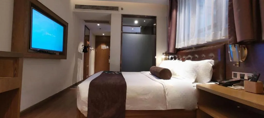 Bed in James Joyce Coffetel·Hengyang Jiefang Road Xianfeng Dock