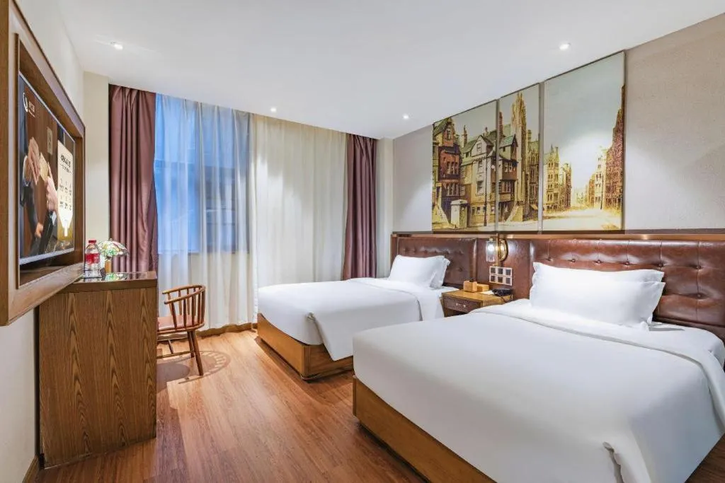 Bed in James Joyce Coffetel·Hengyang Jiefang Road Xianfeng Dock