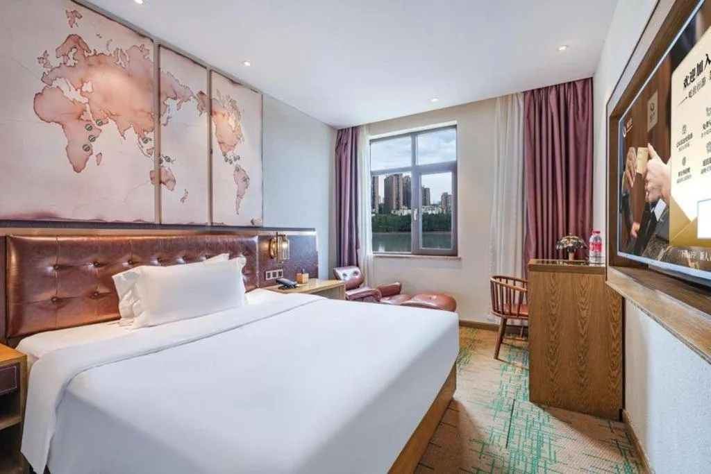 Bed in James Joyce Coffetel·Hengyang Jiefang Road Xianfeng Dock