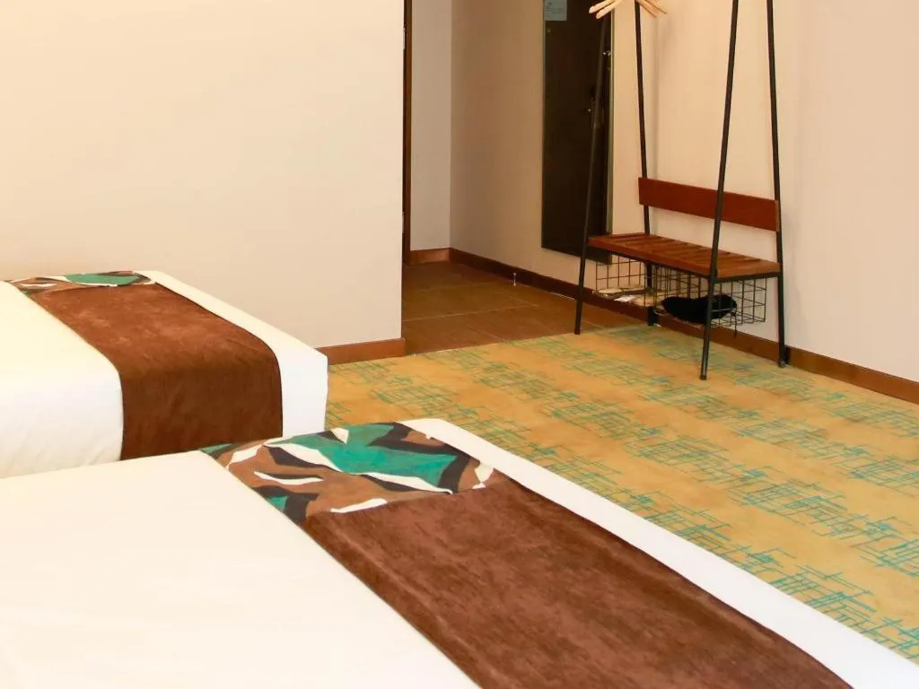 Bed in James Joyce Coffetel Harbin Railway Station Songlei Yuanda Pedestrian Street