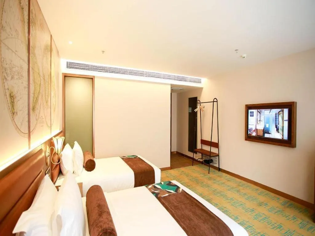 Bed in James Joyce Coffetel Harbin Railway Station Songlei Yuanda Pedestrian Street