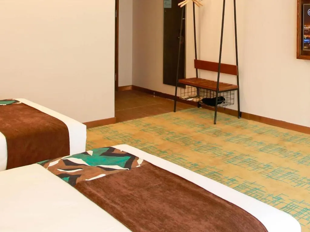 Bed in James Joyce Coffetel Harbin Railway Station Songlei Yuanda Pedestrian Street