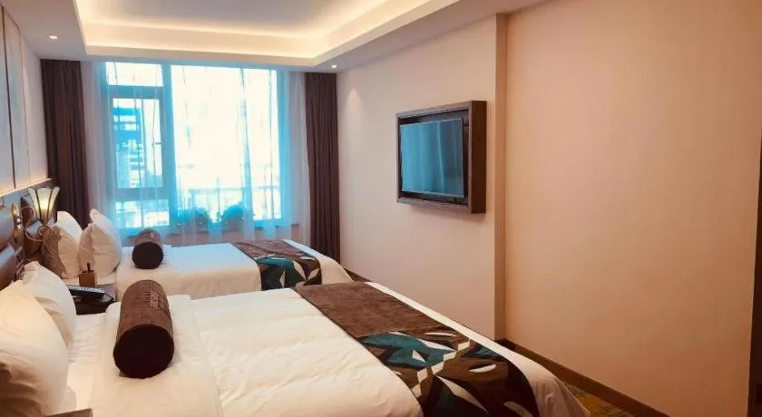 Bed in James Joyce Coffetel Harbin Railway Station Songlei Yuanda Pedestrian Street