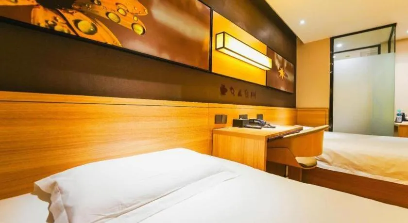 Bed in IU Hotel Nanchang West Railway Metro Station