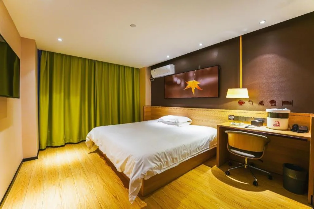 Bed in IU Hotel Nanchang West Railway Metro Station