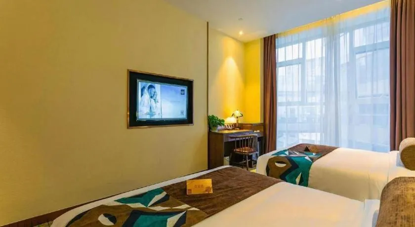 Bed in James Joyce Coffetel Chengdou Wuqing Wanda Plaza