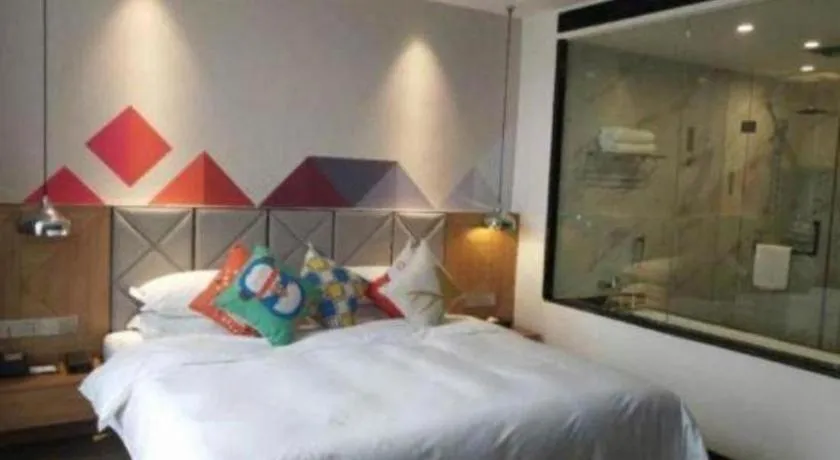 Bed in Borrman Hotel Hechi Bama Central Cultural Plaza