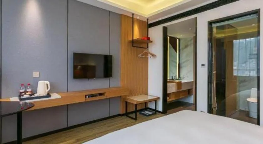 Bed in Borrman Hotel Hechi Bama Central Cultural Plaza