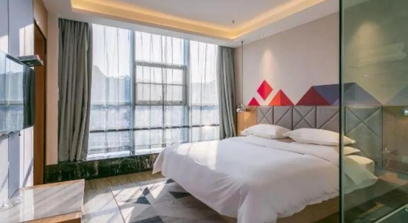 Bed in Borrman Hotel Hechi Bama Central Cultural Plaza