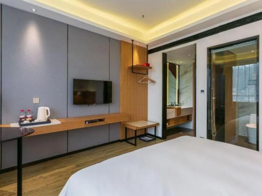 Bed in Borrman Hotel Hechi Bama Central Cultural Plaza