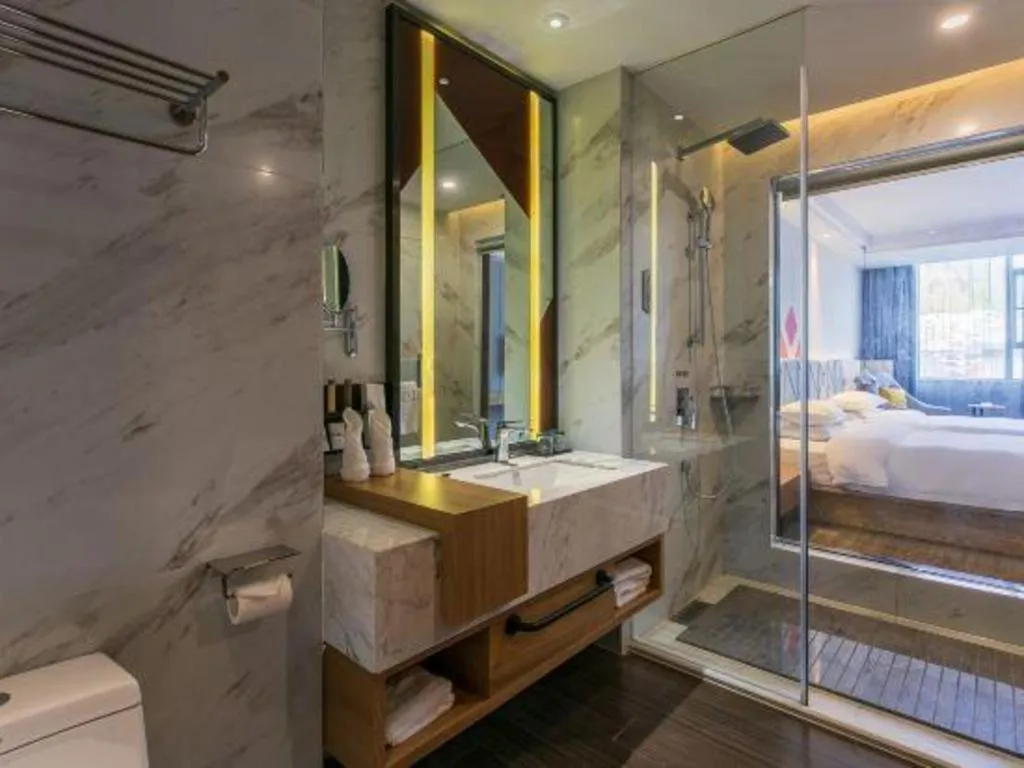 Bed in Borrman Hotel Hechi Bama Central Cultural Plaza