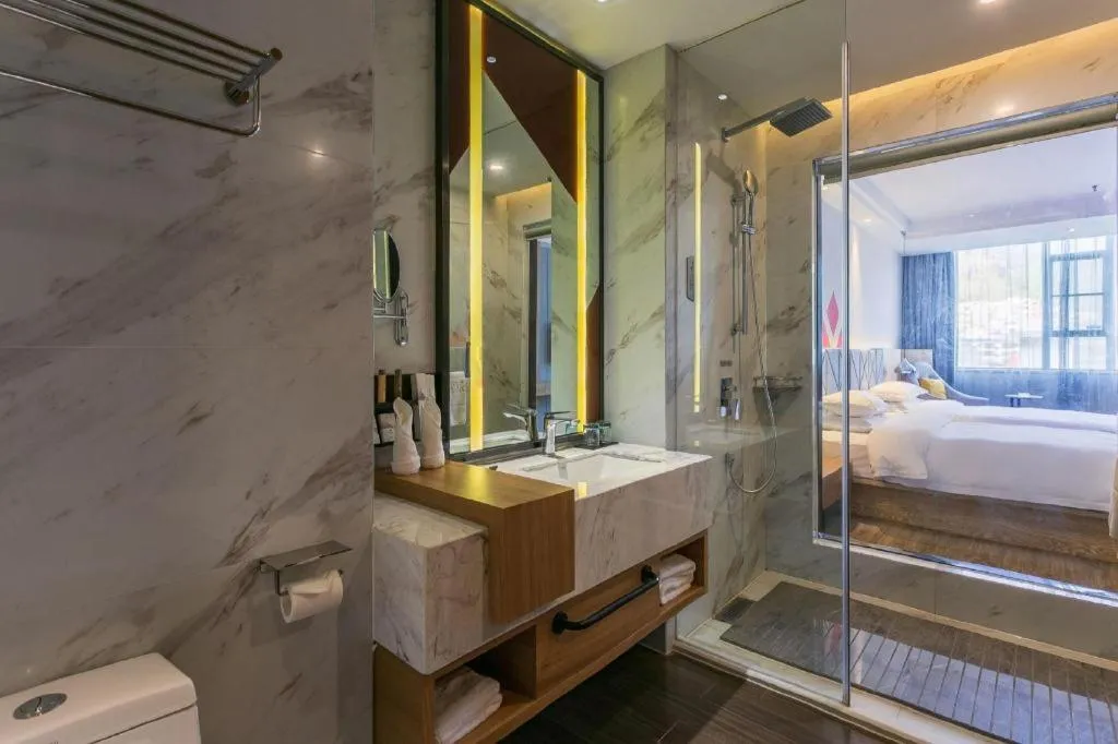 Bed in Borrman Hotel Hechi Bama Central Cultural Plaza