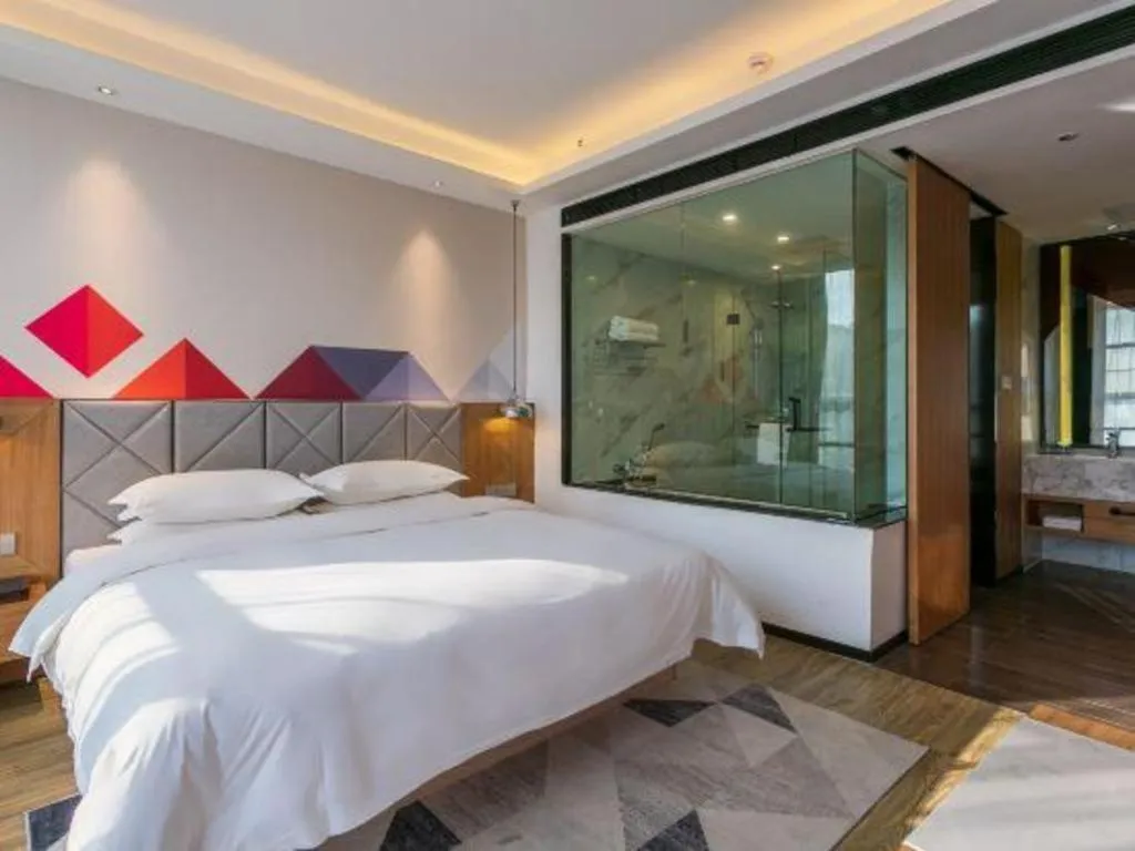 Bed in Borrman Hotel Hechi Bama Central Cultural Plaza