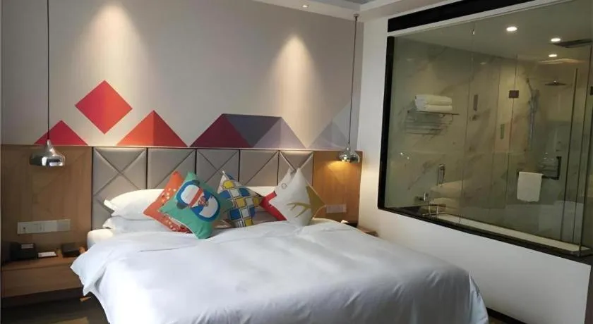 Bed in Borrman Hotel Hechi Bama Central Cultural Plaza