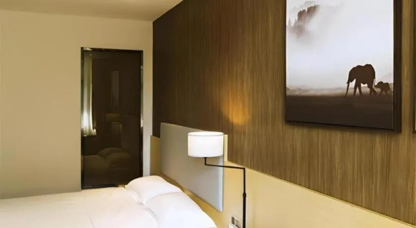 Bed in Jtour Inn Suizhou Yanhe Avenue