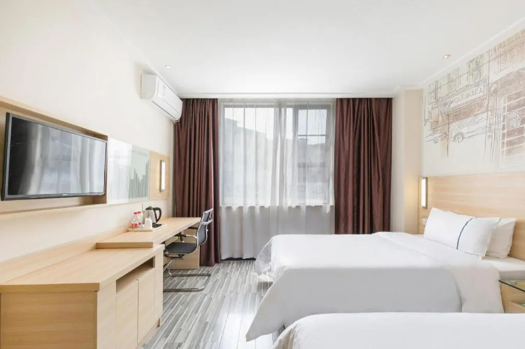 Bed in City Comfort Inn Guangzhou Zengcheng Wanda Plaza Metro Station