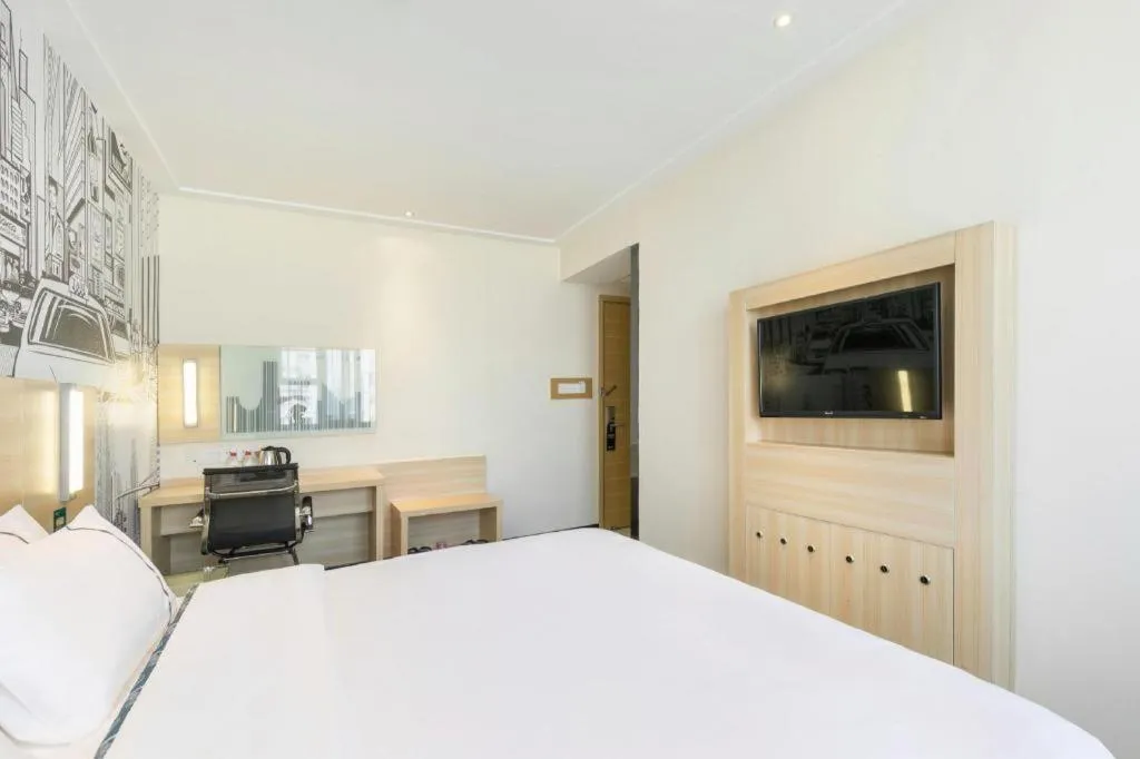 Bed in City Comfort Inn Guangzhou Zengcheng Wanda Plaza Metro Station