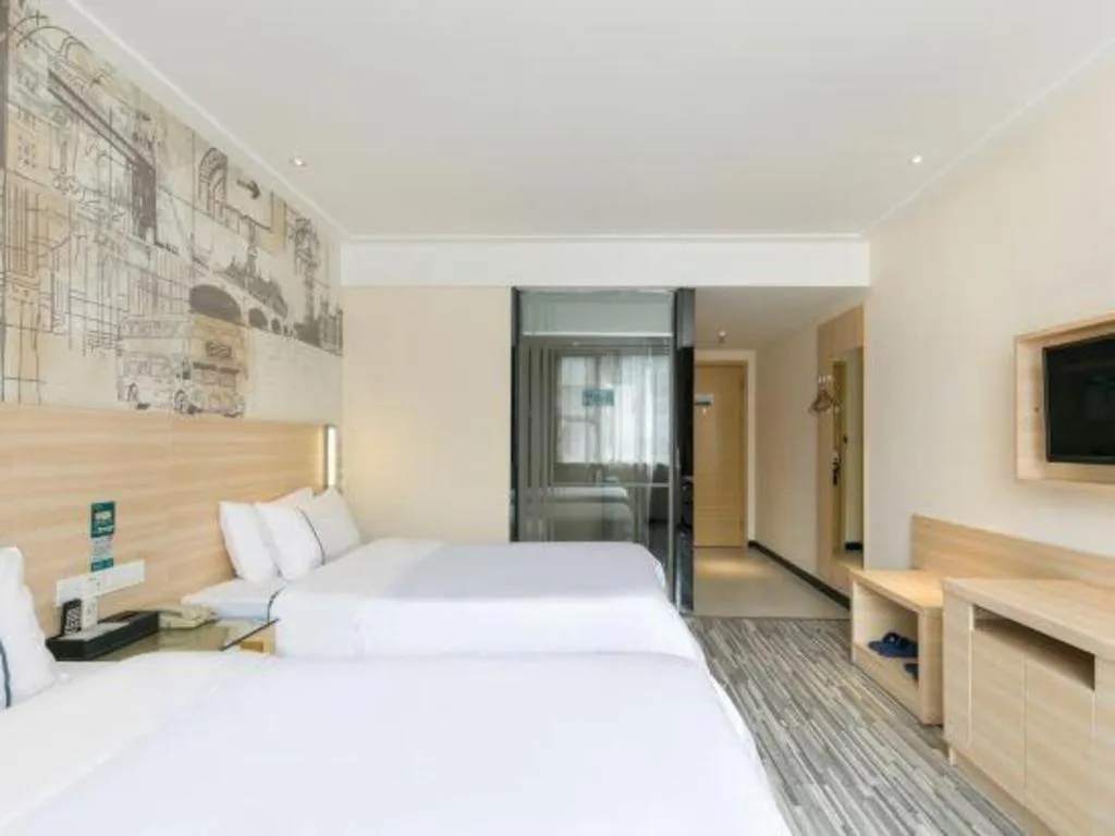 Bed in City Comfort Inn Guangzhou Zengcheng Wanda Plaza Metro Station