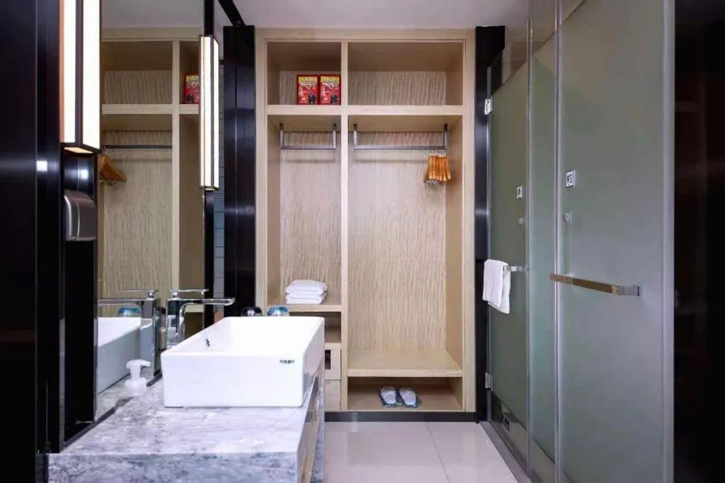 Bed in Echarm Hotel Xiantao Yuantai Weilaicheng