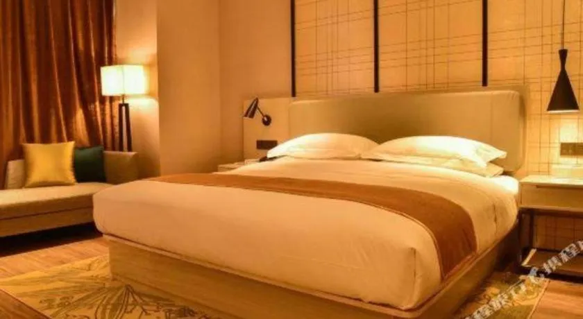 Bed in Echarm Hotel Xiantao Yuantai Weilaicheng