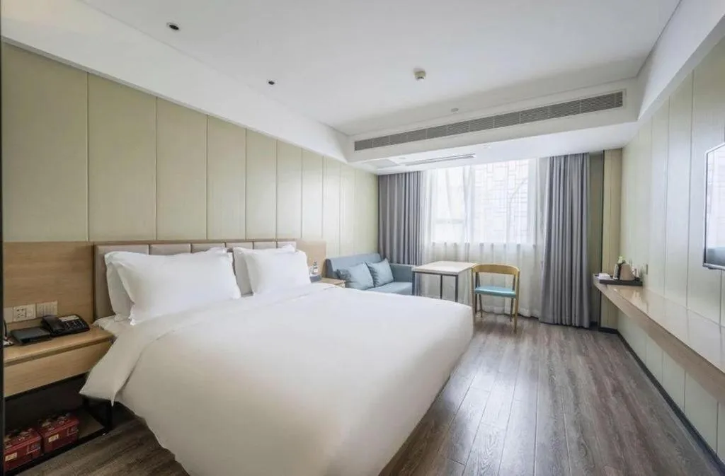 Bed in Borrman Hotel Xiamen Xiang'an Maxiang