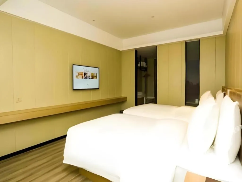 Bed in Borrman Hotel Xiamen Xiang'an Maxiang