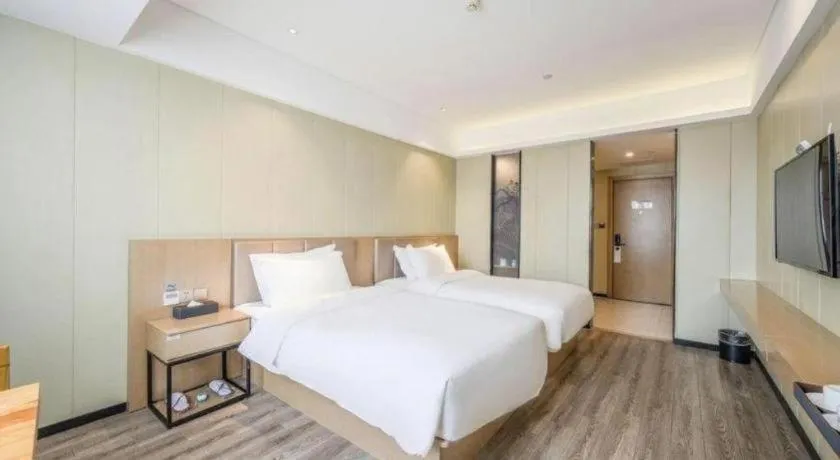 Bed in Borrman Hotel Xiamen Xiang'an Maxiang