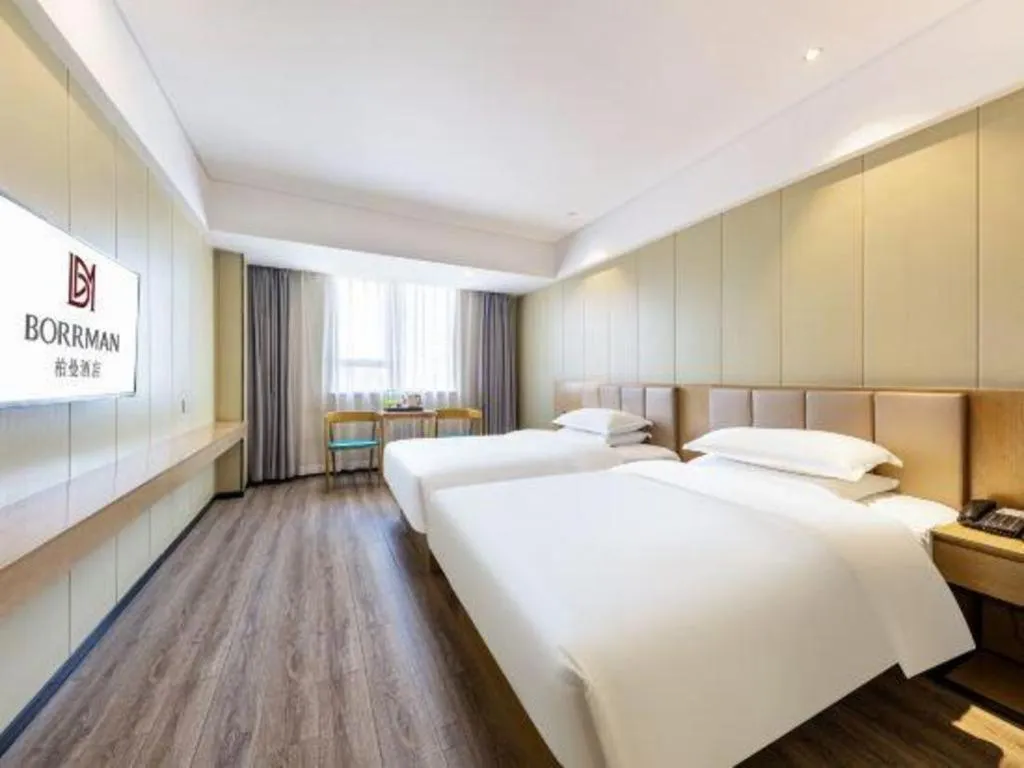 Bed in Borrman Hotel Xiamen Xiang'an Maxiang