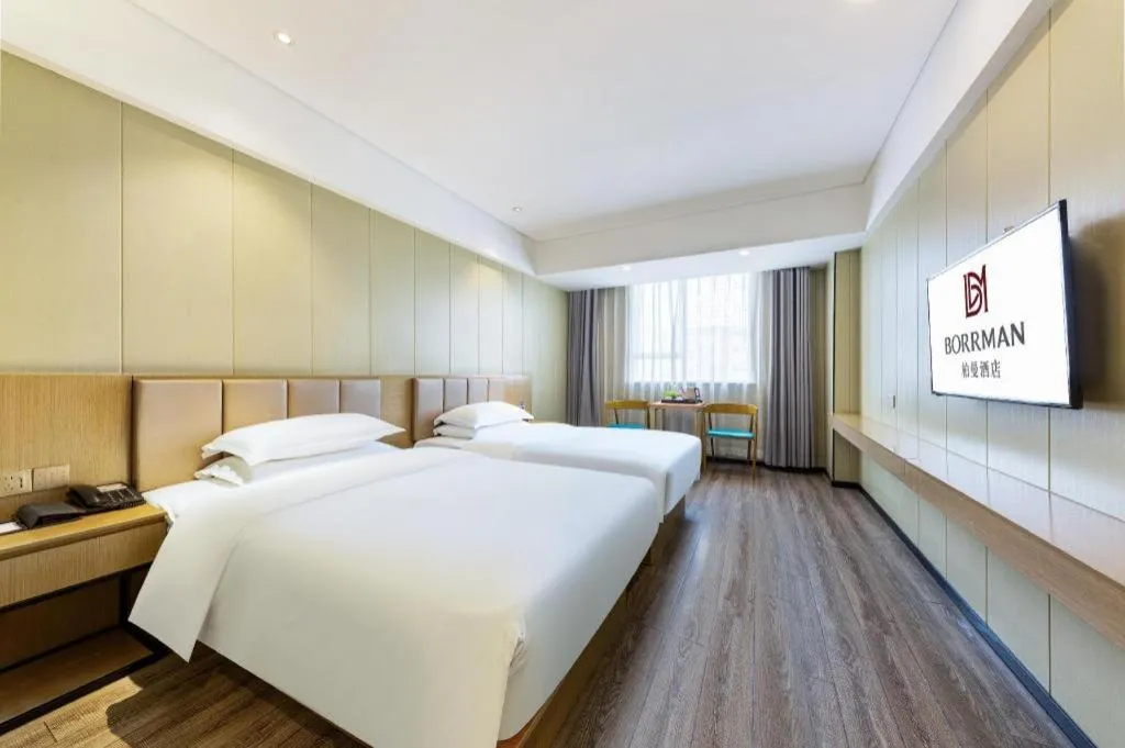 Bed in Borrman Hotel Xiamen Xiang'an Maxiang