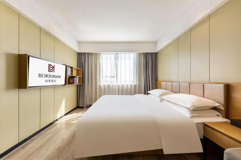 Bed in Borrman Hotel Xiamen Xiang'an Maxiang