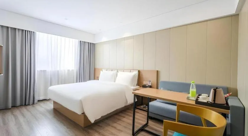 Bed in Borrman Hotel Xiamen Xiang'an Maxiang