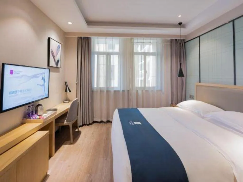 Bed in Echarm Hotel Hefei Binhu Exhibition Center