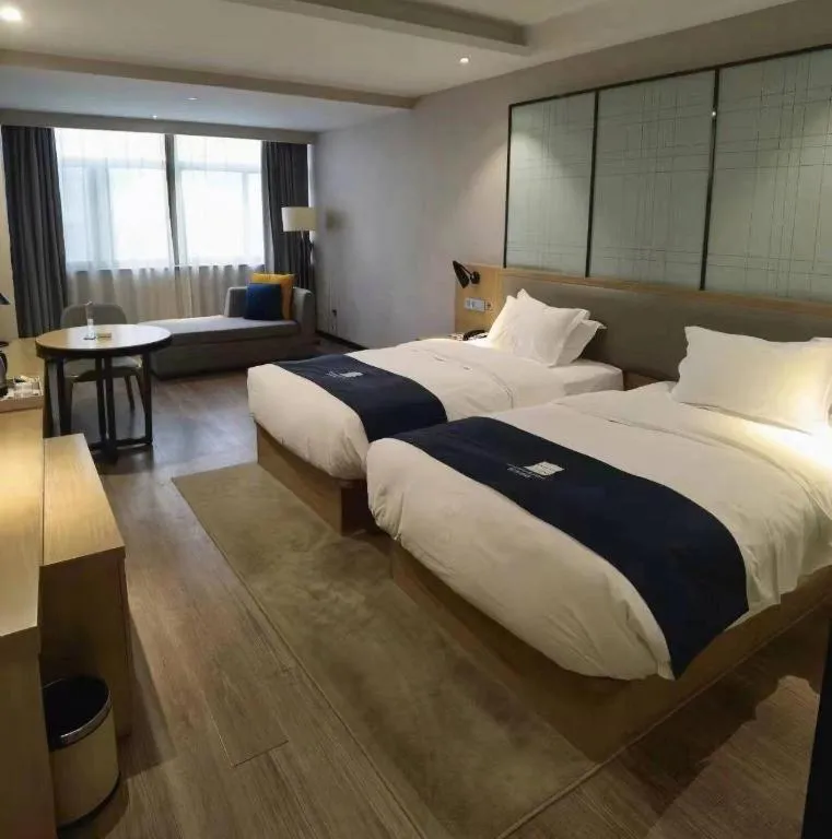Bed in Echarm Hotel Hefei Binhu Exhibition Center