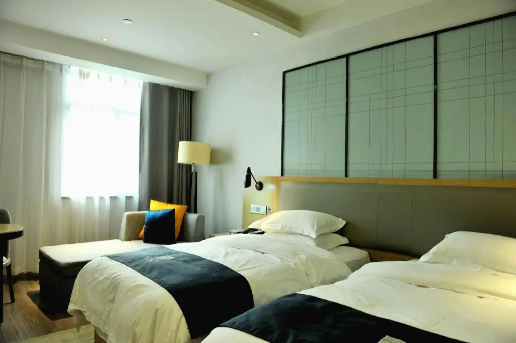 Bed in Echarm Hotel Hefei Binhu Exhibition Center
