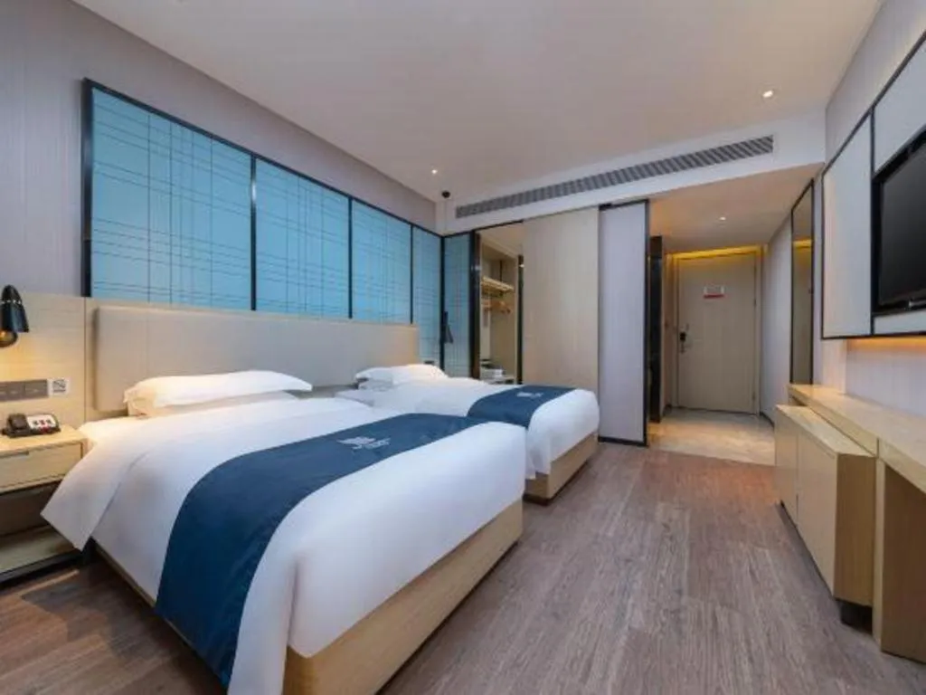 Bed in Echarm Hotel Hefei Binhu Exhibition Center