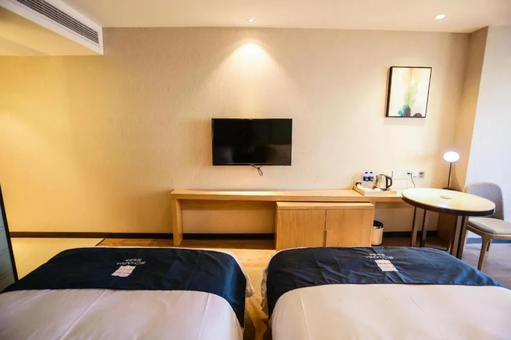 Bed in Echarm Hotel Hefei Binhu Exhibition Center