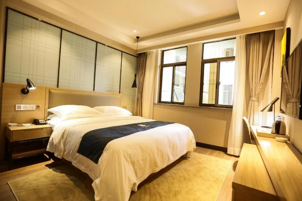 Bed in Echarm Hotel Hefei Binhu Exhibition Center